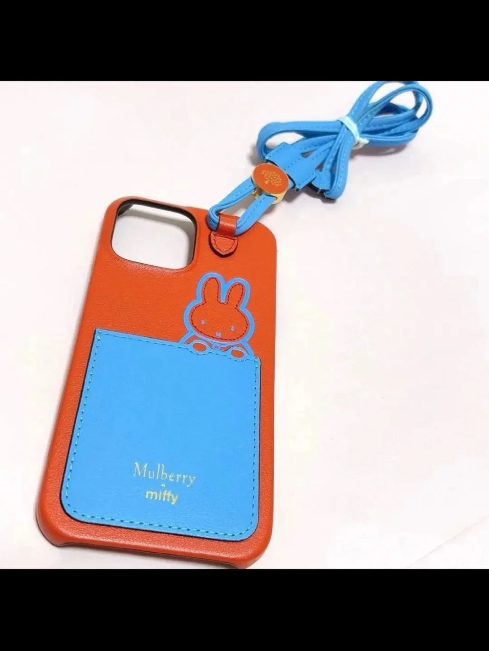 Mulberry Orange Leather Phone Case with Blue Pocket and Strap